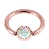 Rose gold coloured ball closure ring with crystal