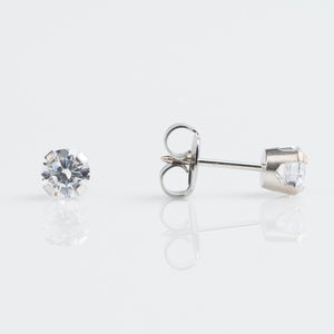 9ct white gold 5mm Tiffany set cubic zircon earrings pierced with the Studex System 75 Gun