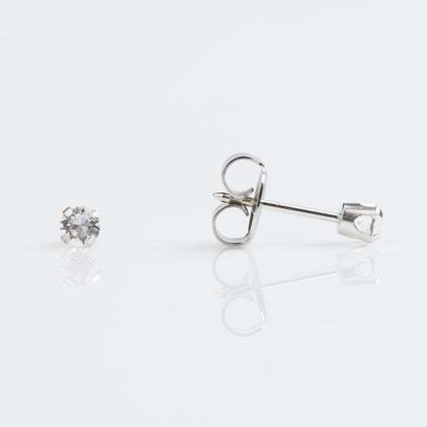 9ct white gold earring with 3mm tiffany set clear cubic zircon pierced with the Studex System 75 Gun