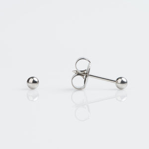 9ct white gold ball earrings pierced with the Studex System 75 Gun